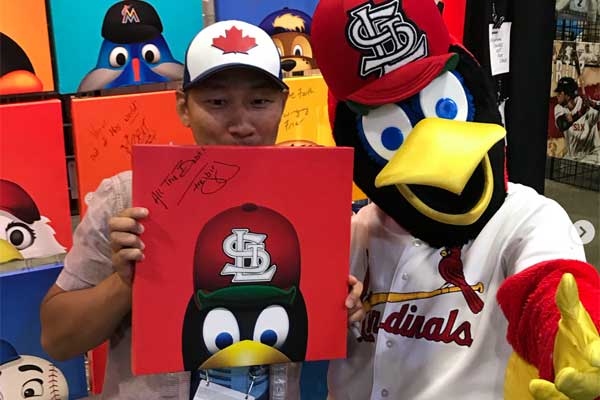 S. Preston with Fredbird, the St. Louis Cardinals mascot