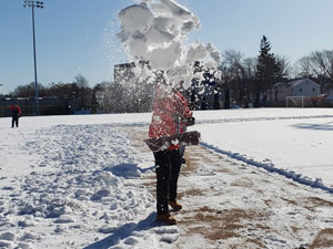 Carlos Escano Shoveling at Winterball